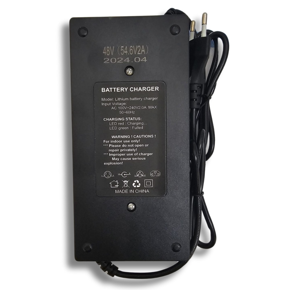 c444c7b8-e5e4-4ecf-b056-1bceb337353c Caricabatterie rapido 6V–48V 2A per bici e monopattini elettrici. Sicuro, compatto e con LED. Ordina ora su Pezzellashop.